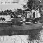 Children in boats at Pine River Fish Fry, 1920s.