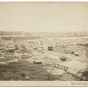 Black and white photograph of the lower West Side and Wabasha Bridge, c.1885. 