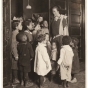Black and white photograph of Gertrude Brown with children at Phyllis Wheatley House, ca. 1924.