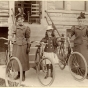 Two women and girl with bicycles