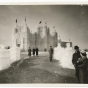 Black and white photograph of the 1937 Winter Carnival Ice Palace, looking west toward State Office Building.