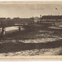 Black and white photograph the south side of Fort Snelling showing the gatehouse and shops, c.1864.