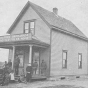 Black and white photograph of the Crispus Attucks Orphanage and Old Folks Home at its original location on East Acker Street in St. Paul, c.1905.