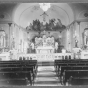 photograph of the altar and main aisle of St. Peter Claver Church