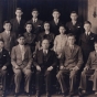 Black and white photograph of young men and women of the 1935 graduating class of the St. Paul Talmud Torah. Max Gordon, the director of the Talmud Torah, is seated at the center of the front row.