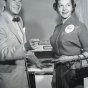 Black and white photograph of Beatrice Ojakangas from Duluth, MN and Ronald Reagan at the Bake-Off in Los Angeles, 1957.