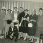 Black and white photograph of a Farm Bureau men in fashion show, 1962. 