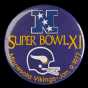Color image of a plastic pin-back button commemorating the participation of the Minnesota Vikings in Super Bowl XI, played against the Oakland Raiders in Pasadena, California, 1977. The Raiders defeated the Vikings 32–14.