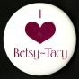 Color image of a "I love Betsy-Tacy" pinback button, manufacturer unknown, c.1990-1994.  