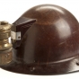 Iron miner's helmet with lamp