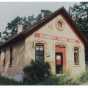 Photograph of the Ramsey District #28 School House after it was repurposed as the Ramsey Town Hall. Photographer unknown, ca. 1970s.