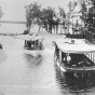 photograph of two boats on a river