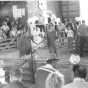 Black and white photograph of a 4-H livestock auction at the Murray County Fair, ca. 1980s.