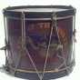 Image of hand-painted drum composed of a walnut-stained wood shell and black hoops with rope tuning cords. 