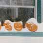 Color image of Jack-o'-lanterns covered in snow during the Halloween Blizzard, 1991. Photograph by Richard Sennott, RPA, Minneapolis Star Tribune.