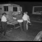 Flour City Ornamental Iron Works strike casualty entering an ambulance