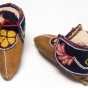 Pair of Ojibwe child's leather moccasins. Made in Isle, Mille Lacs County c.1910.