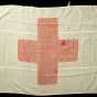 Color image of a Red Cross Flag carried by Theresa Ericksen to the Philippines during the Spanish–American War and to France during World War I.