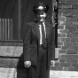 photograph of uniformed motorette