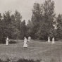 Black and white photograph of the Graham Hall tennis courts, ca. 1908.