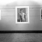 Black and white photograph of paintings by Clement Haupers on exhibit, c.1940. 