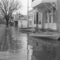 Black and white photograph of flood at Chaska, 1965. Photographed by Les Melchert.