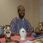 Photograph of St. Paul ESL teacher Abdisalam Adam in his office, June 24, 2004.