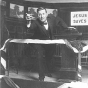 Photograph of Reverend John Sornberger, a lumberjack sky pilot, preaching c.1930.