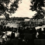 Black and white photograph of the bicentennial kick-off celebration featuring Lieutenant Governor Rudy Perpich at End-o-Line Railroad Park, July 1976.