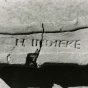 Black and white photograph  of a brick manufactured at the Imdieke brick yard between 1883 and 1915 in Meire Grove.