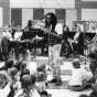 Black and white photograph of Bobby McFerrin & SPCO at Groveland Park Elementary School in St. Paul, 1995.