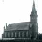 Black and white photograph of St. John the Baptist Catholic Church in Meire Grove, 1887.