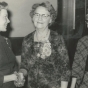 Black and white photograph of Mary Vattendahl, left, presents the 1966 Woman of Achievement award to Clara Berg (center) as Bergetta Logen, a long-time Crookston resident and the BPWC’s fourth president (right) looks on, 1966.