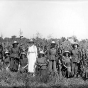 Incarcerated women posing by a cornfield