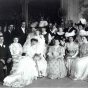 Black and white photograph of the Gertrude Hill–Michael Gavin wedding party in the James J. Hill House drawing room, 1906. Photographer: T.W. Ingersoll.