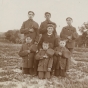 Black and white photograph of students and a teacher at a Native Americann boarding school, c.1900.