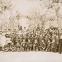 Black and white photograph of students and staff of a Native American boarding school, c.1900.