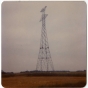 Workers finish connecting the upper and lower portions of a high-voltage power-line tower in Grant County, Minnesota, 1976–1978.