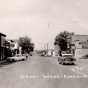 Black and white photograph of Main Street in Currie, 1956.