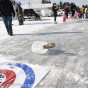 Eelpout curling competition at the International Eelpout Festival, 2015. Photo by Josh Stokes. 