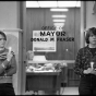 Black and white photograph of a candlelight vgil at Mayor Fraser’s office, 1983. 