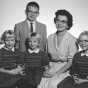 Black and white photograph of Carol Thompson with her children, Margaret, Amy, Patty, and Jeff, c.1961.