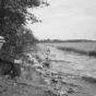 Black and white photograph of Dr. Henry Schmidt fishing, ca. 1918.