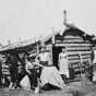 Swedish immigrants outside their cabin in Minnesota, ca. 1880. 