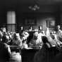 Black and white photograph of Red Cross workers making bandages, c.1916.