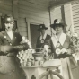 Black and white photograph of Evelyn Lightner (at left) and Red Cross workers distributing food, c.1918.