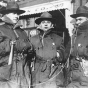 Black and white photograph of three members of the Minnesota Home Guard during the Streetcar workers strike of 1917. The stars they wear designate them as special deputy sheriffs of Ramsey County.