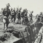 Black and white photograph of candidates jumping over an entrenchment at the Officers’ Training Camp, Fort Snelling, 1917. 