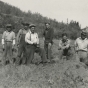 Black and white photograph of Indian Civilian Conservation Corps crew on the stockade site at the end of the first day of work, Grand Portage, Minnesota, 1937. Photographed by Willoughby Maynard Babcock, Jr.