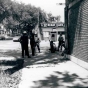 Black and white photograph of National Guardsmen patrolling Plymouth Avenue in North Minneapolis, July 1967.